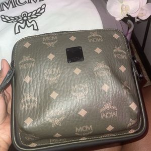 This is a MCM Crossbody men’s bag. It’s has never been worn, not even once.